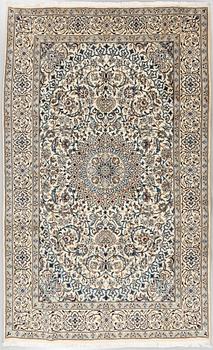 A NAIN PART SILK RUG, 306 x 191 cm.