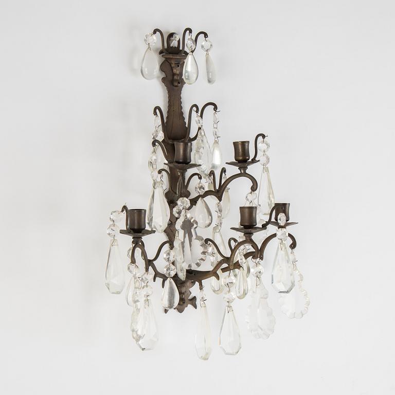 A pair of brass and cut glass five-light  baroque-style wall lights.