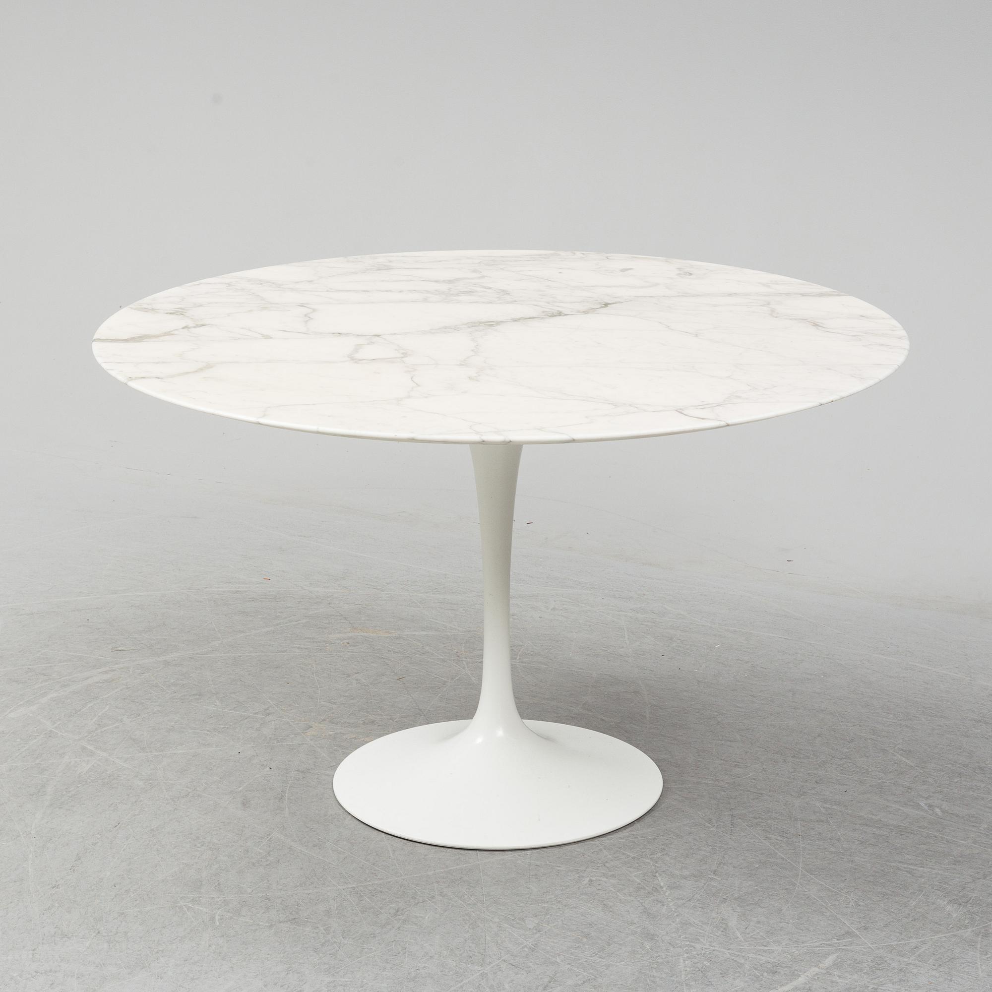 EERO SAARINEN, a 'Tulip' table by Knoll.