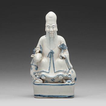 687. A blue and white figurine of a Chinese Immortal sitting on his deer, Ming dynasty (1368-1644).