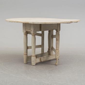 An 18th century Baroque gateleg table.