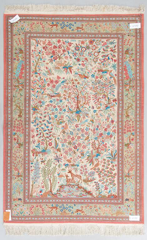 A silk Qum rug, central Persia, c. 210 x 138 cm.