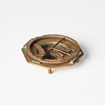 An engraved brass octagonal equinoctial compass sundial by Andreas Vogler (Augsburg, c. 1766-90).