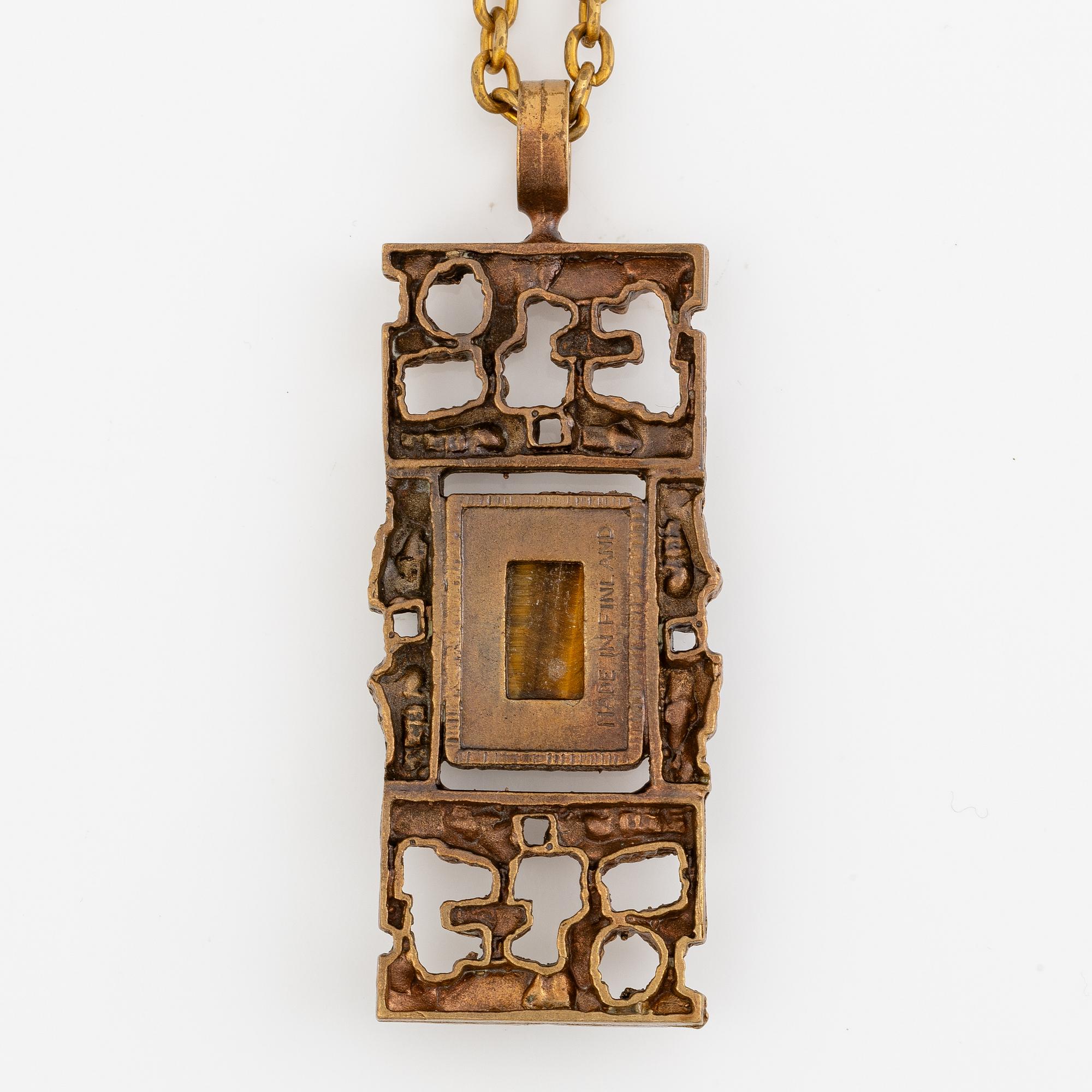 Pentti Sarpaneva, Collier,brons med tigeröga. Möjligen Pentti Sarpaneva,