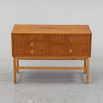 A 1950's/60's teak veneered chest of drawers.