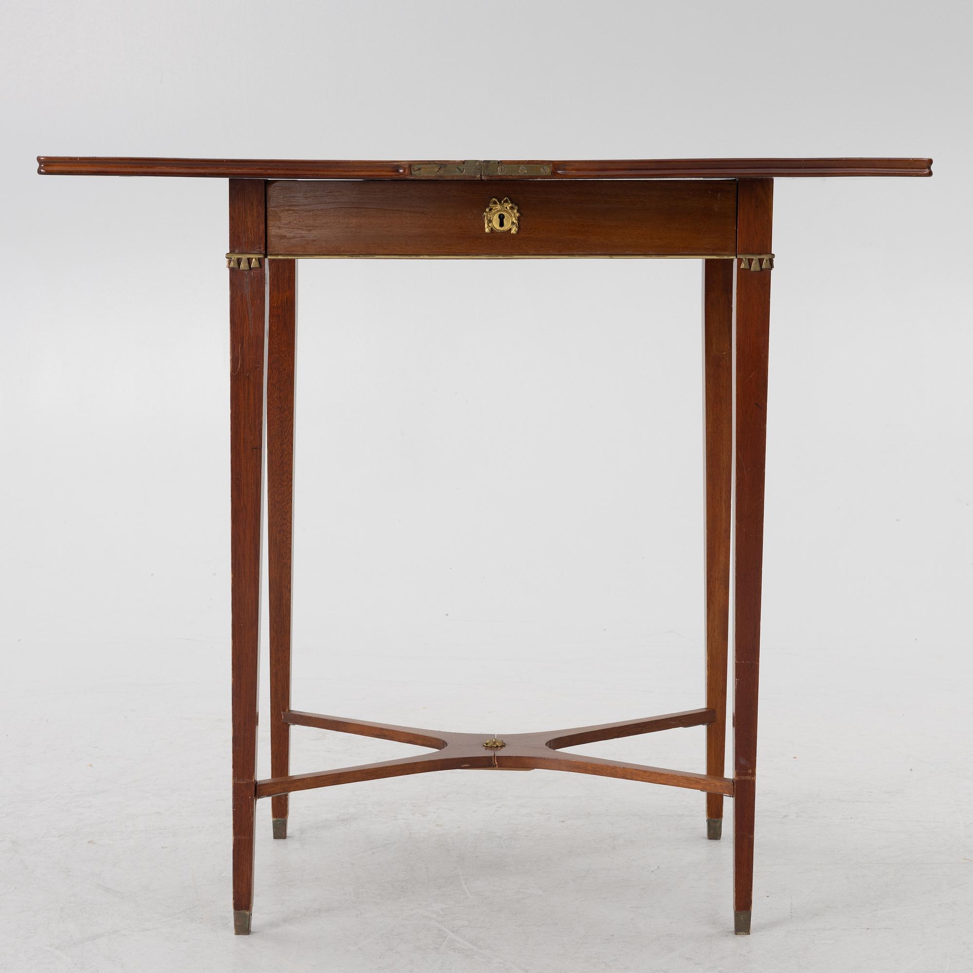 A late Gustavian style games table/sewing table, early 20th century.