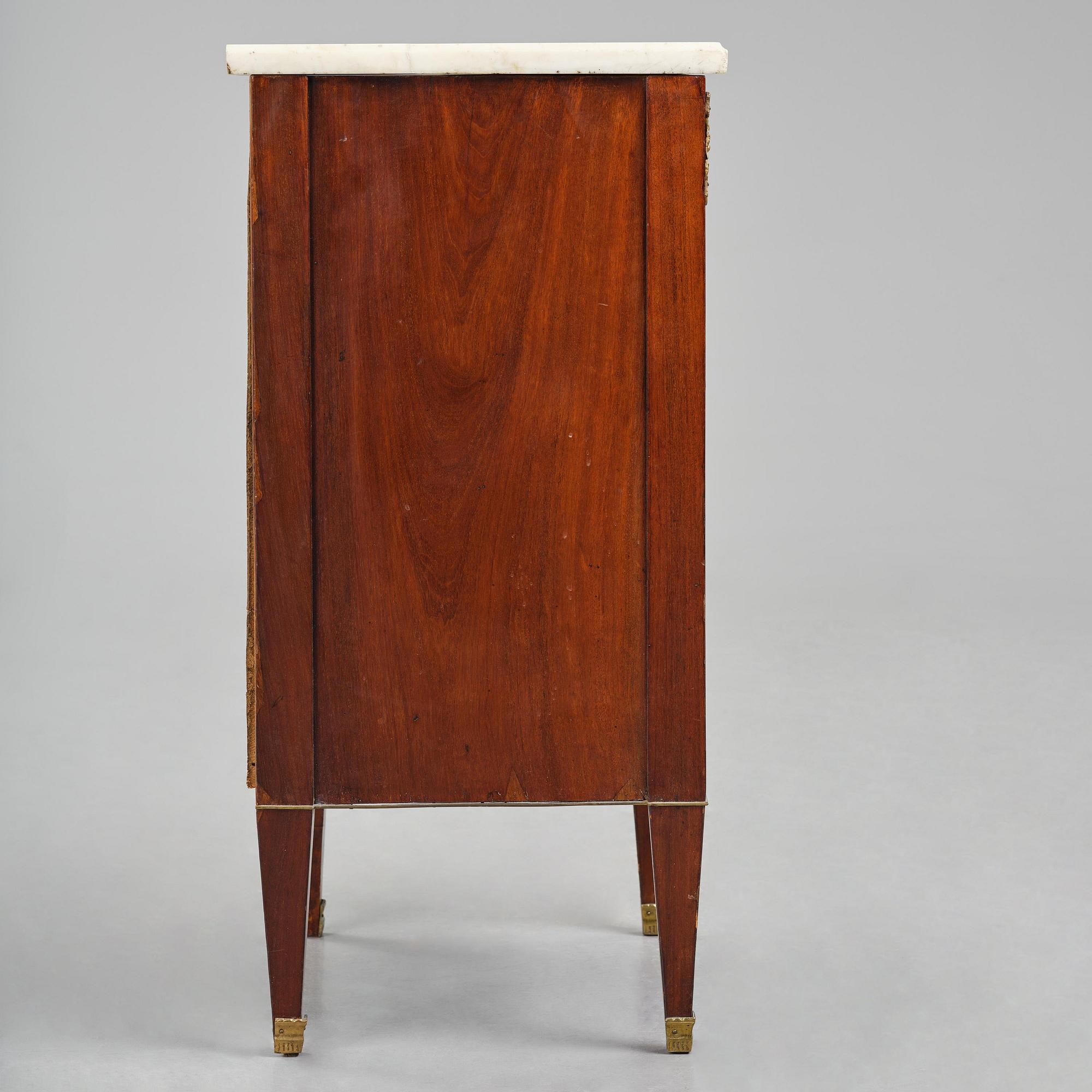 A late Gustavian mahogany commode, Stockholm, late 18th century.
