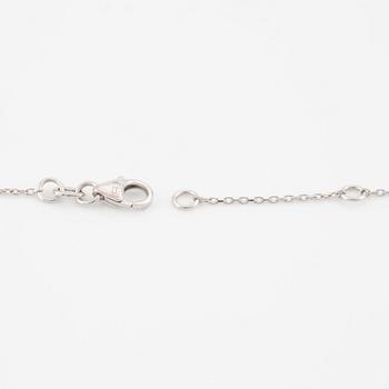 Necklace, 18K white gold heart-shaped with princess cut and pear-shaped diamonds.