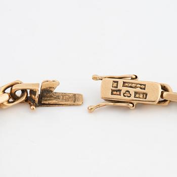 18K gold bracelet.