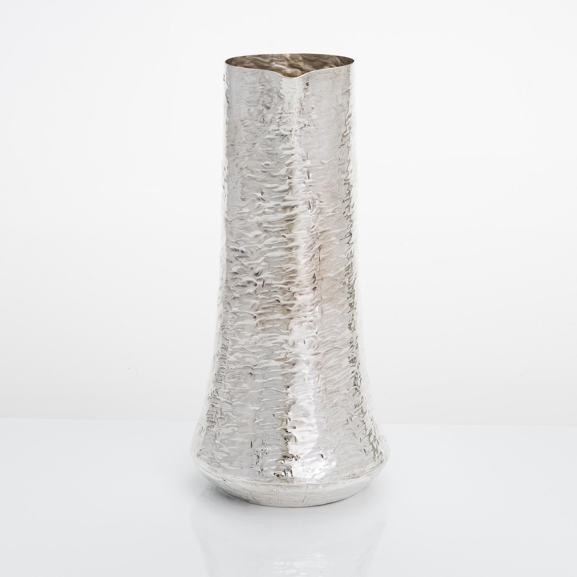 Tapio Wirkkala, a silver pitcher with six silver beakers, marked TW, Kultakeskus, Hämeenlinna Finland 1973 and 1966.