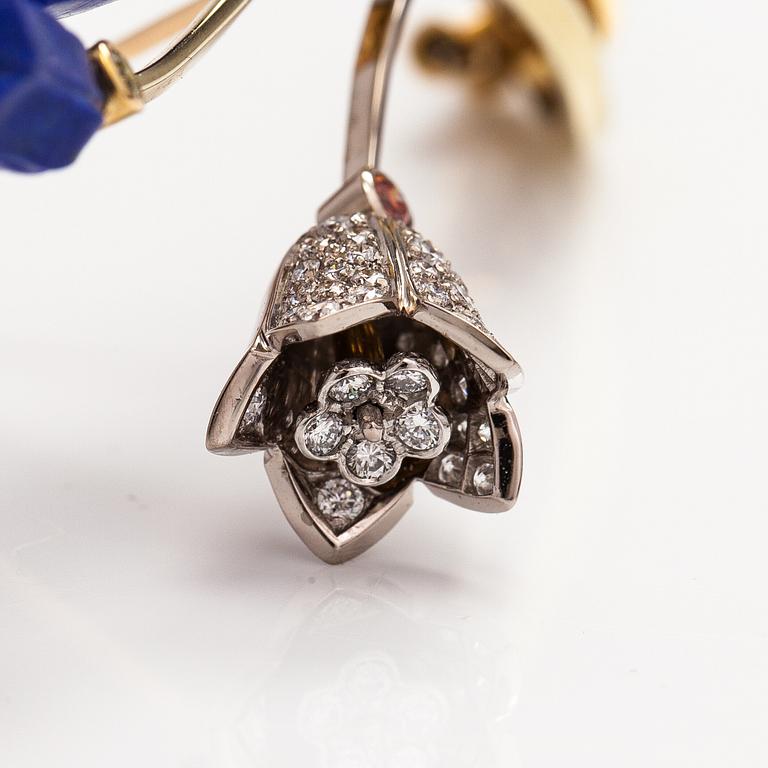 Raimo Nieminen, Brosch "Valonkukka", 18K gult. grönt och vitt guld, diamanter ca 1.40 cy och skuren lapis lazuli. 2005.