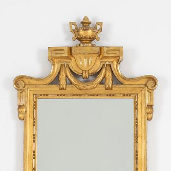 A Gustavian style mirror, first half of the 20th Century.