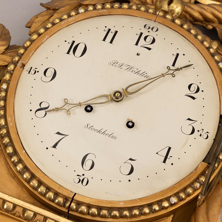 Wall clock, Gustavian style, P.N. Wohlin, Stockholm, 20th century.