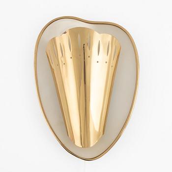 A Swedish Modern brass wall sconce, 1950's.