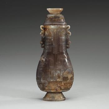 A large archaistic vase with cover, presumably chalcedony, China.