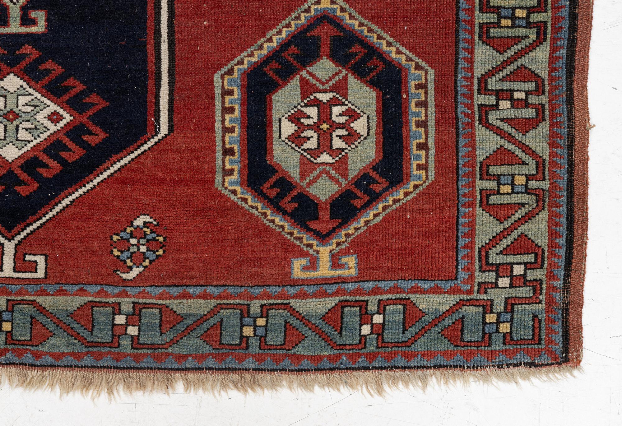 An antique Kazak rug, South Caucasus, c 212 x 147 cm.