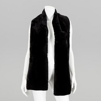 A fur scarf by Hermes.