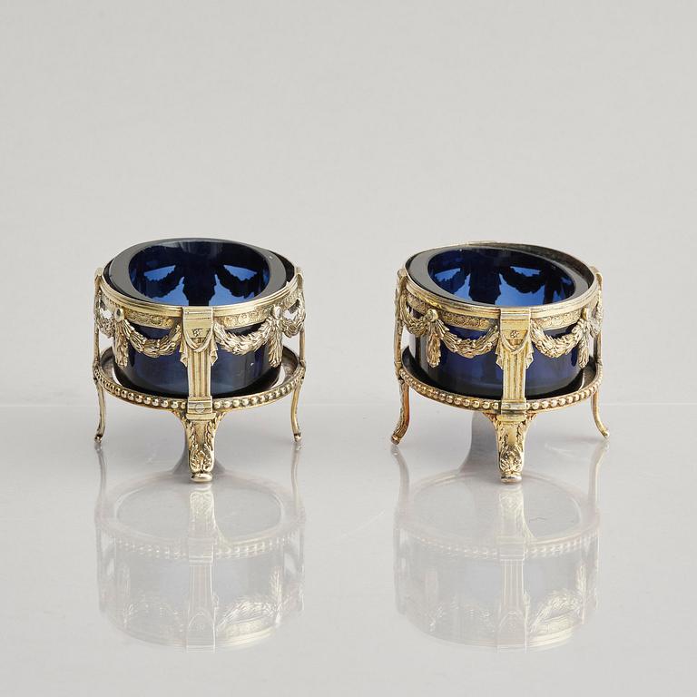 A pair of Swedish 18th century silver and blue glass salt cellars, mark of Pehr Zethelius, Stockholm 1775.