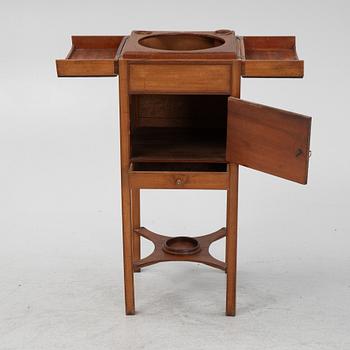 A mahogany shaving stand, 19th Century.