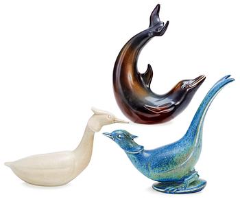 Three Gunnar Nylund stoneware figures, a dolphin, a pheasant and a great crested grebe, Rörstrand.