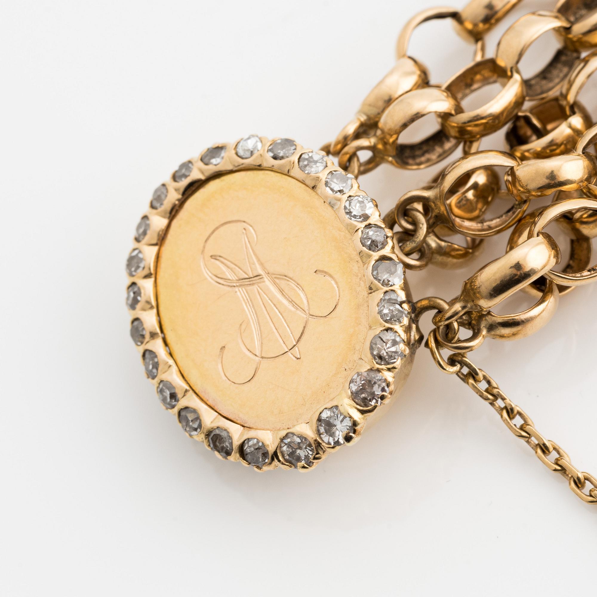Bracelet, gold multi-strand pea links, monogram with frame of old-cut diamonds.