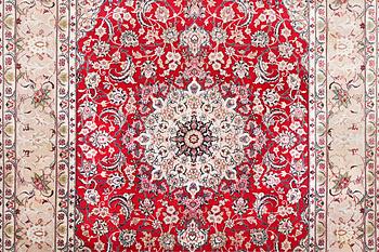 An Esfahan carpet, part silk, signed Rahimi, c. 298 x 206 cm.