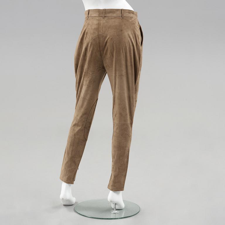 A pair of green suede pants by Ralph Lauren.