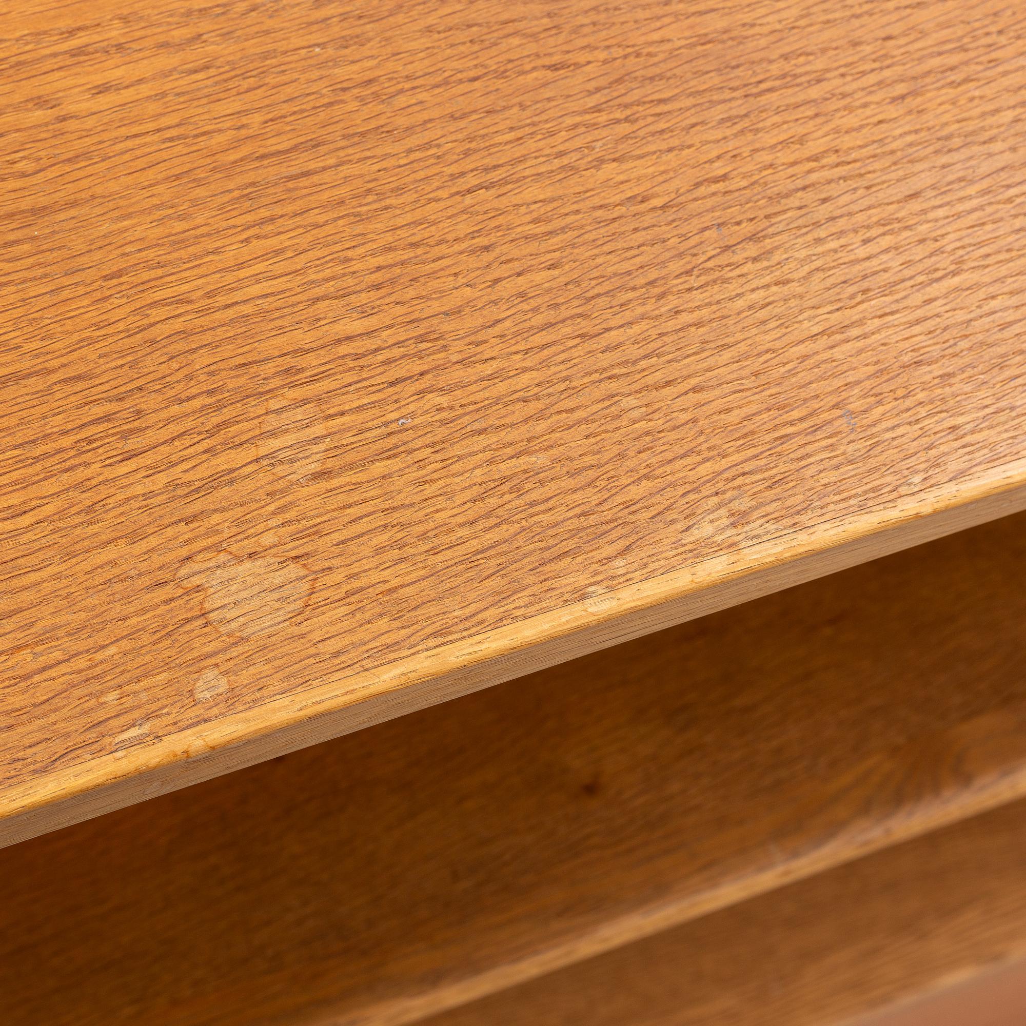 Hans J. Wegner, 2 cabinets and a shelf with a writing flap, Ry furniture, dated 1957.