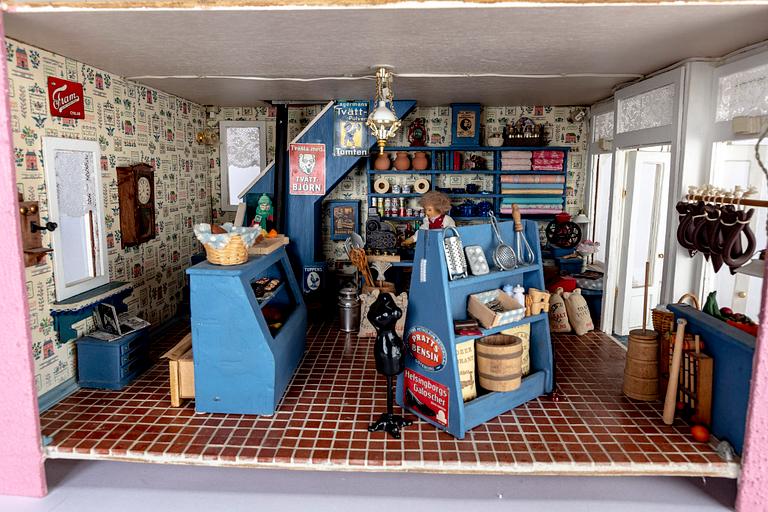 A handmade dolls house later part of the 20th century.