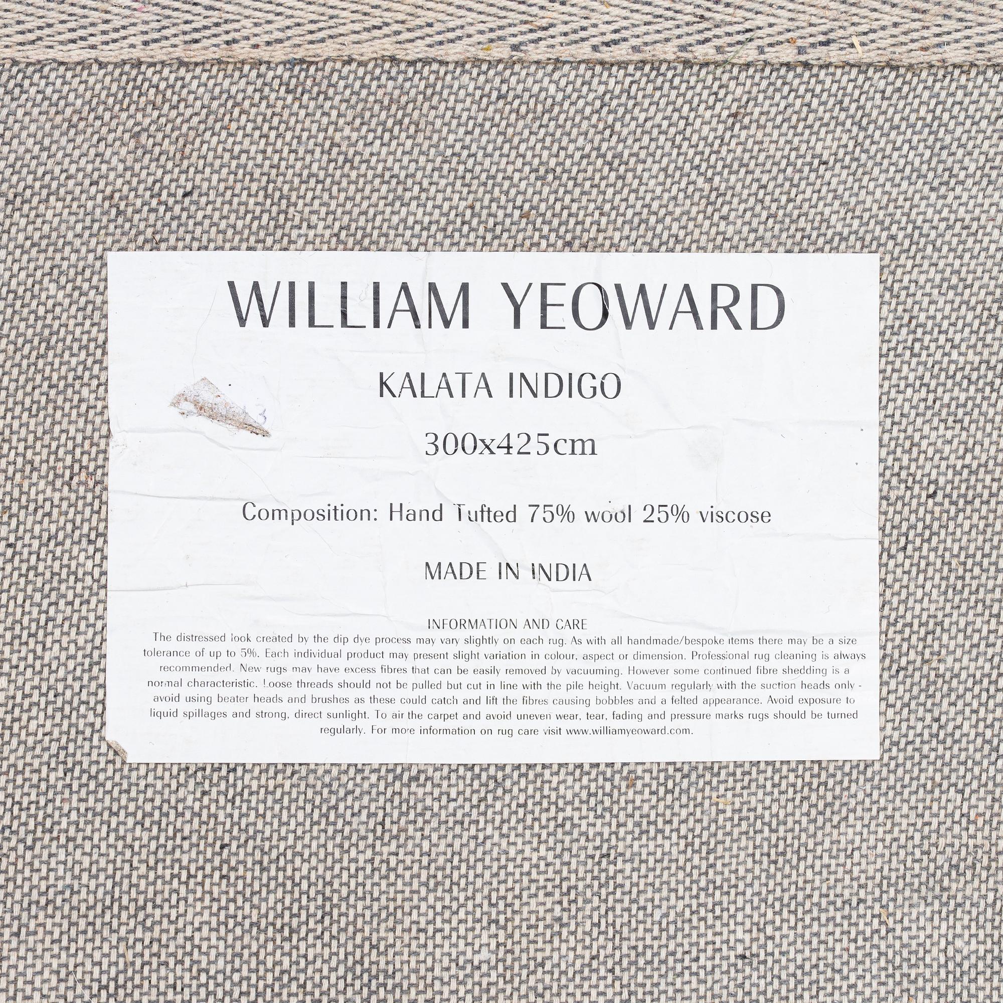 William Yeoward, a 'Kalata Indigo' carpet, circa 425 x 300 cm.