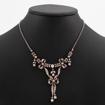 A necklace 14K gold and silver with old-cut diamonds.