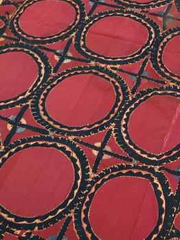 AN ANTIQUE UZBEK SUZANI EMBROIDERY, ca 253,5 x 142 cm (as well as 246x35, 108x9 and 138x7 cm).