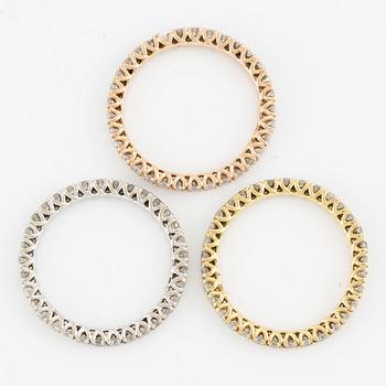 Rings, three pieces, set with brilliant-cut diamonds.