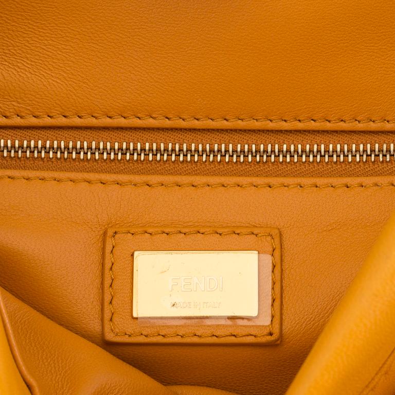 a Fendi 'Peekaboo' bag.