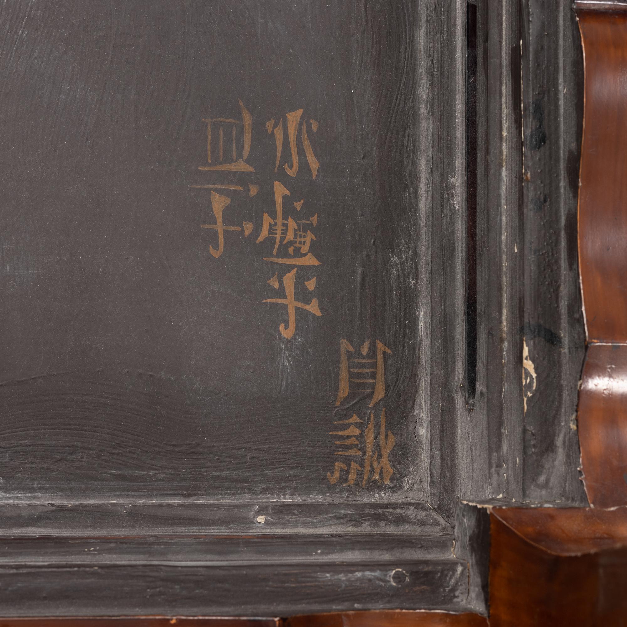 A Chinese lacuered kang table, second half of the 20th century.