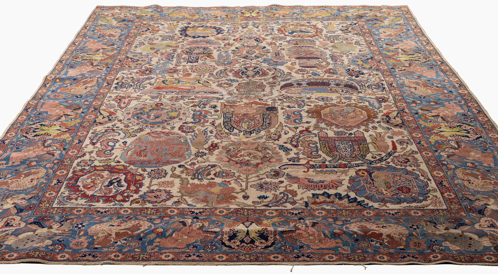 A semi-antique Tabriz ‘Zir Khaki' carpet, ca 366 x 251 cm.