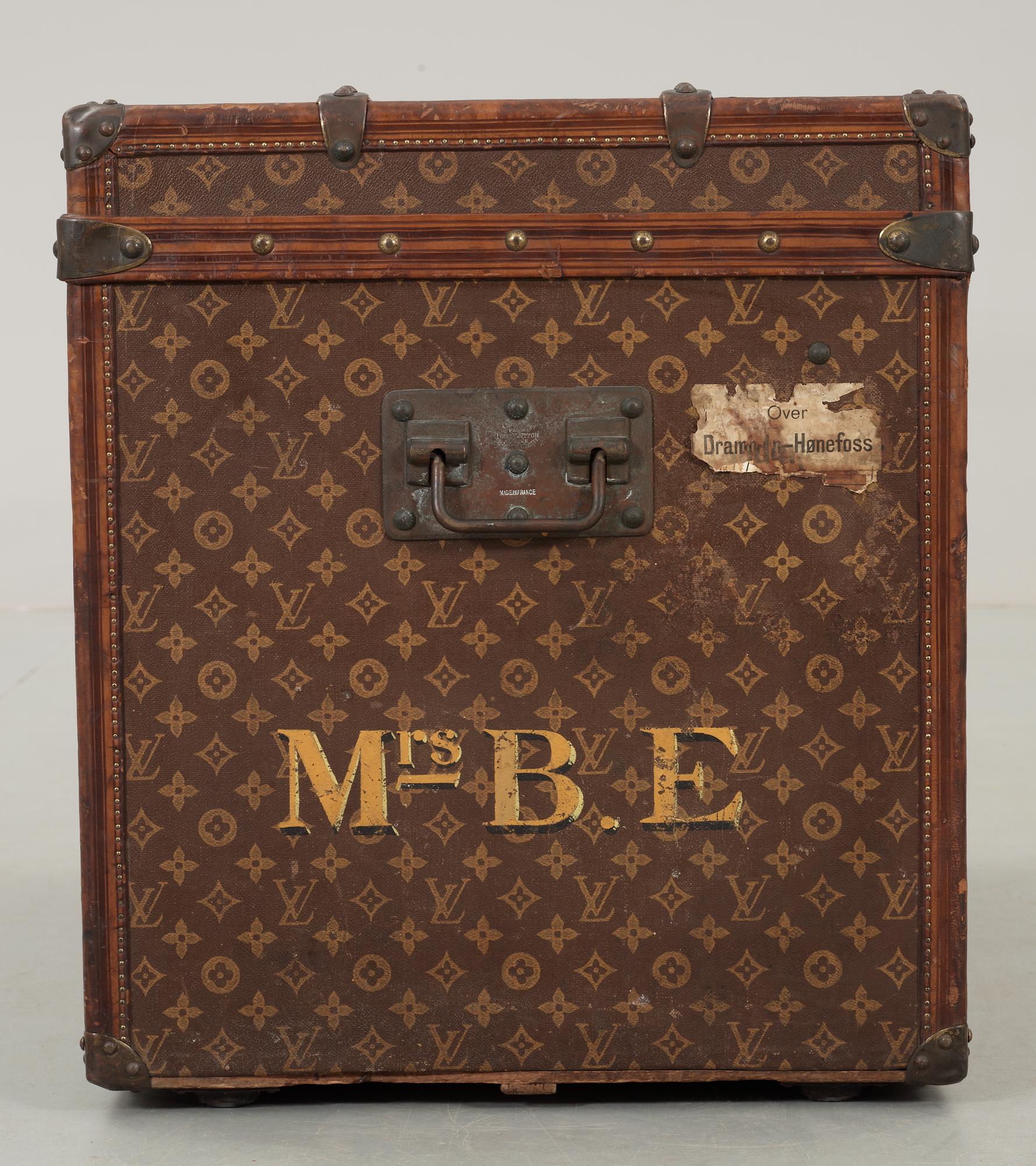 An early 20th cent monogram canvas trunk by Louis Vuitton.