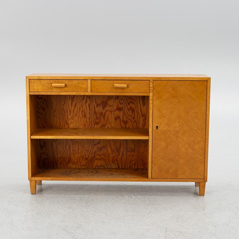 A bookcase with cabinet, 1930s.