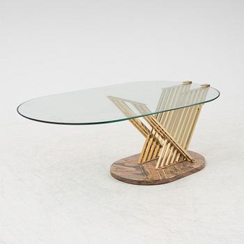 A glass, brass and stone coffee table, 1980's.