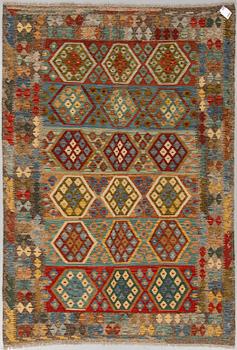 An oriental kilim, around 250 x 170 cm.