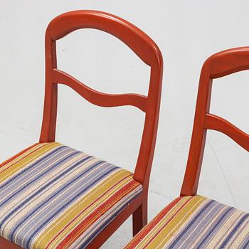 A pair of painted chairs by Carl Malmsten, second half of the 20th Century.