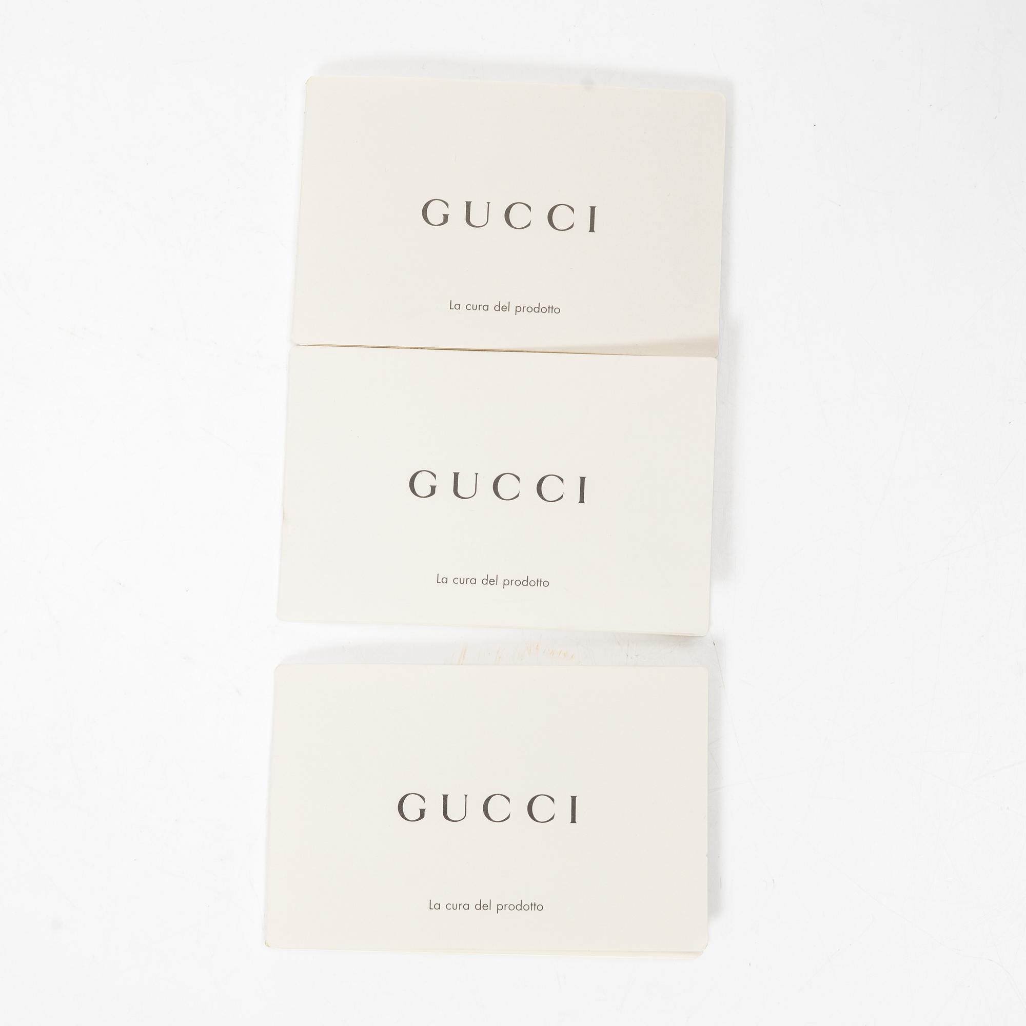 Gucci, a handbag.