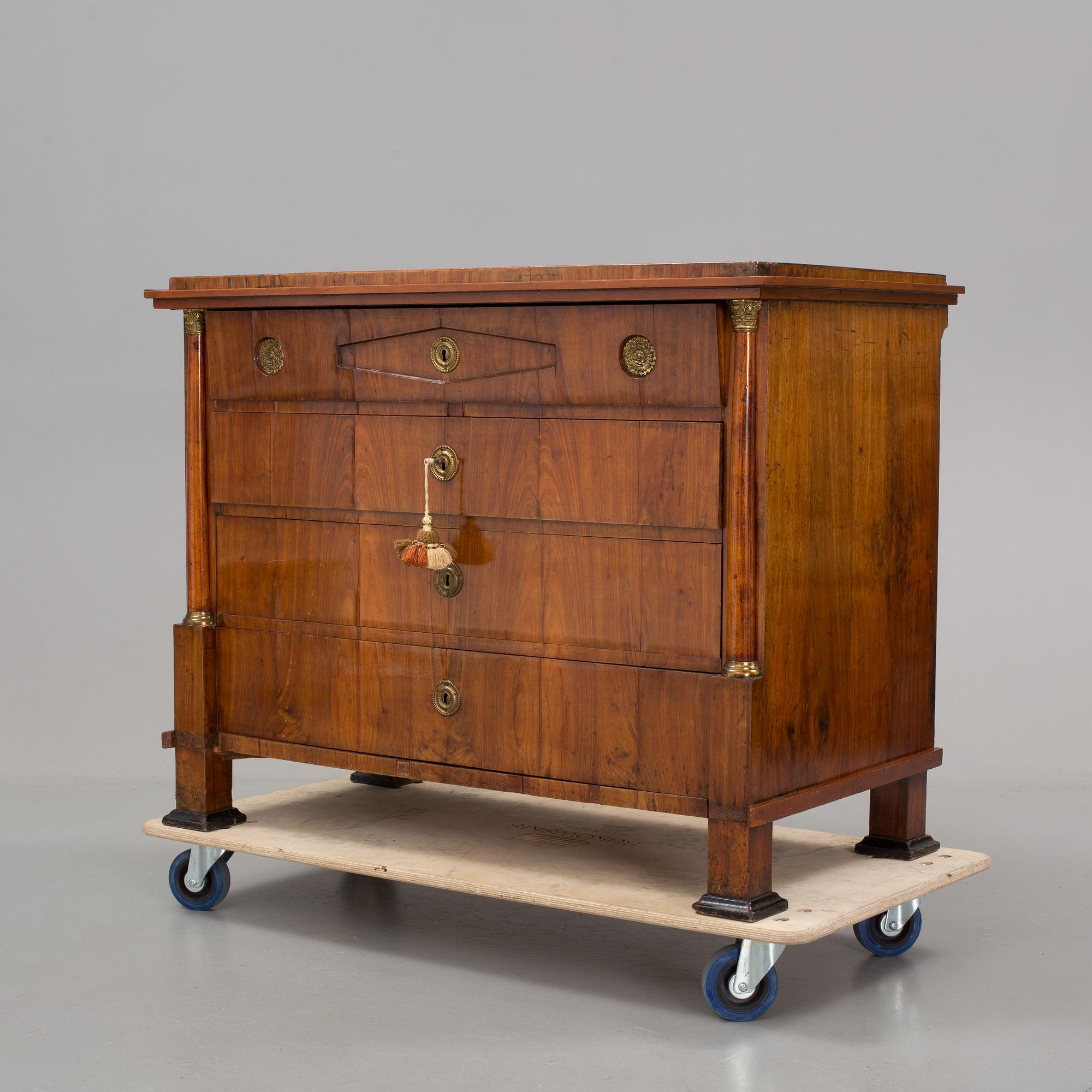 An early 19th century, Empire secretaire cabinet.