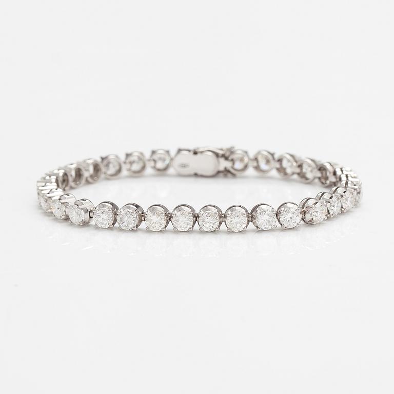 Tennisrannekoru, 18K valkokultaa ja briljanttihiottuja timantteja n. 7.50 ct yht.