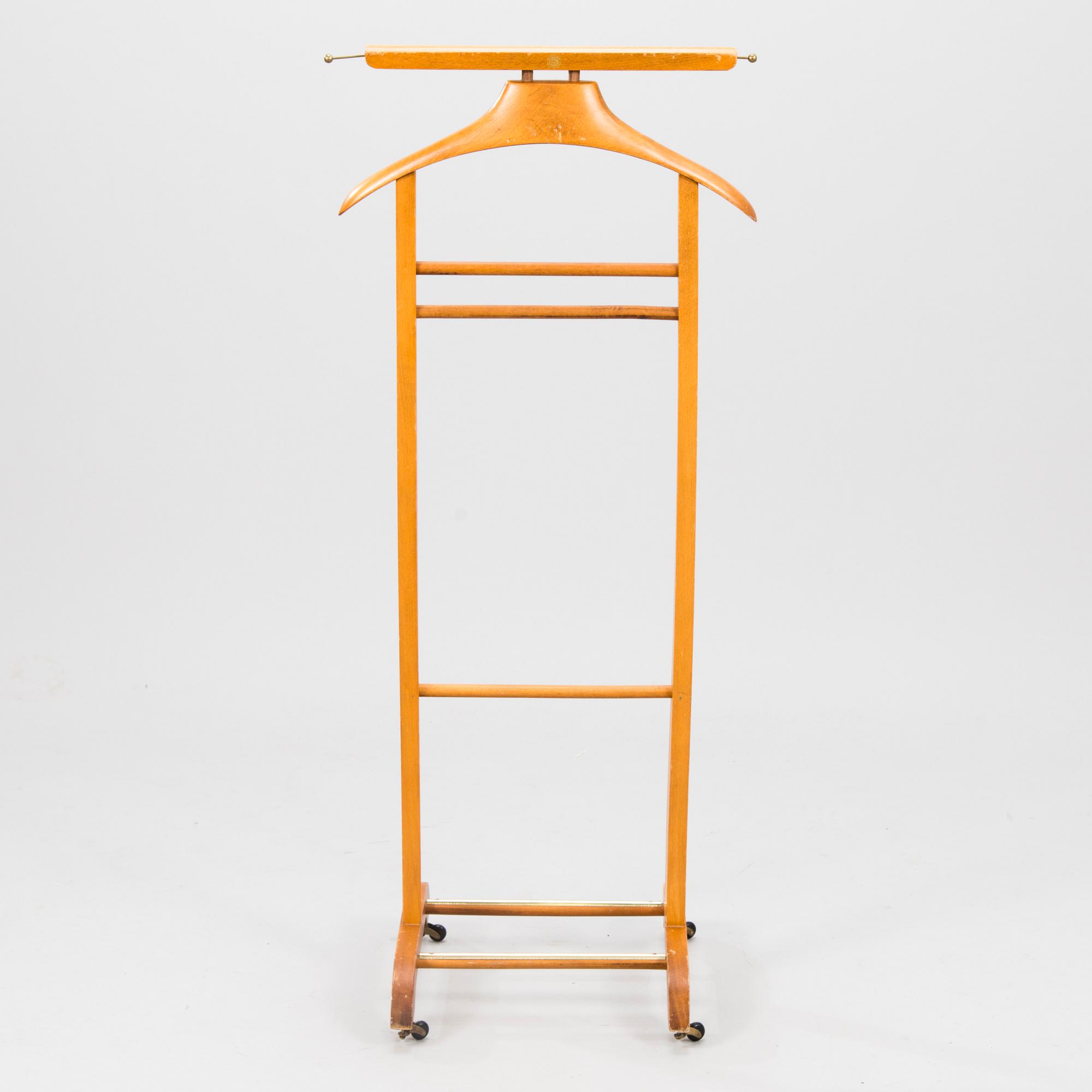 An Italian Fratelli Reguitti valet stand, the latter half of 20th century.