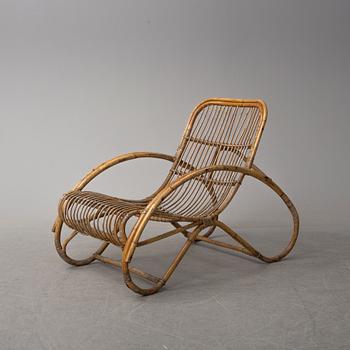 a pair of rattan easy chairs, 20th century.