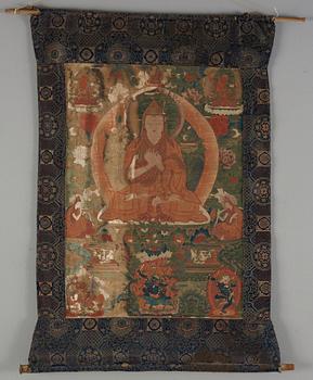 A finely painted Tibeto-Chinese thangka portraying Tsong Khapa, 18th/early 19th century.