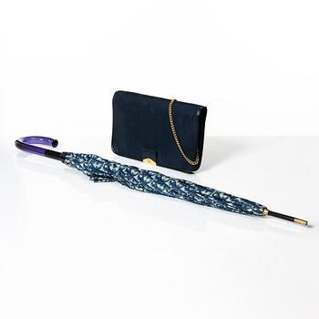 Christian Dior, evening bag and umbrella.