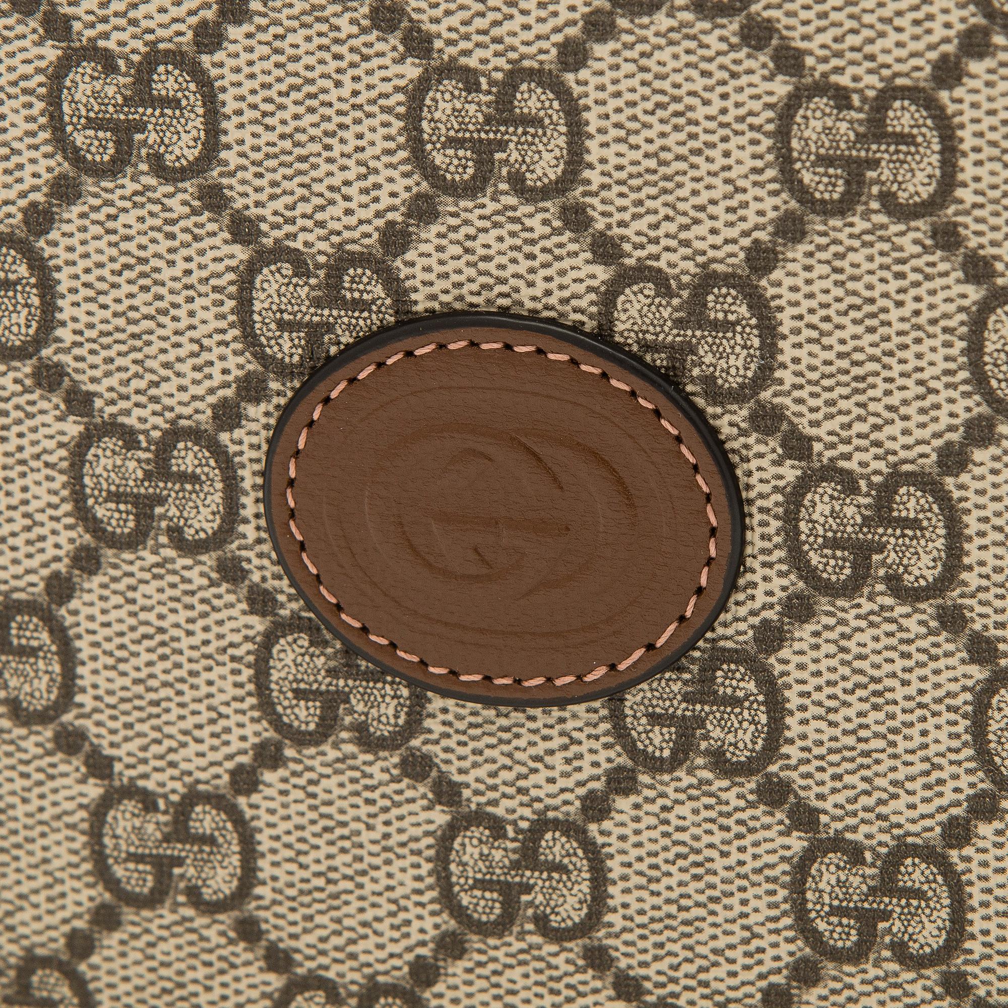 Gucci, "GG Supreme" laukku.