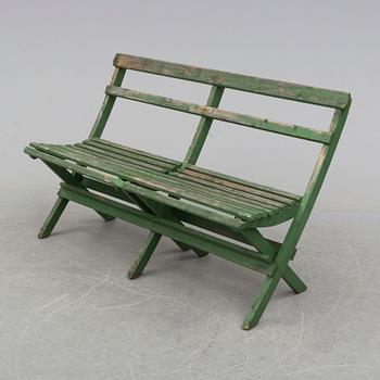 A mid 20th century garden sofa.